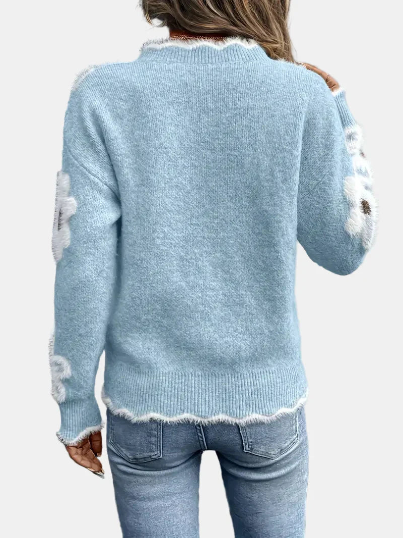 Unicloth.™ | Pull fleuri intemporel à col V