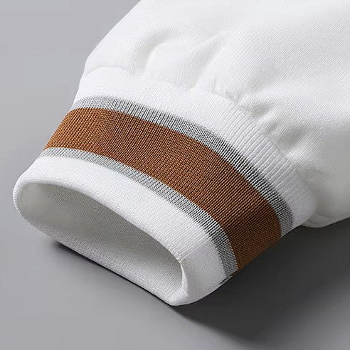 Unicloth.™ | HOODED VARSITY JACKET